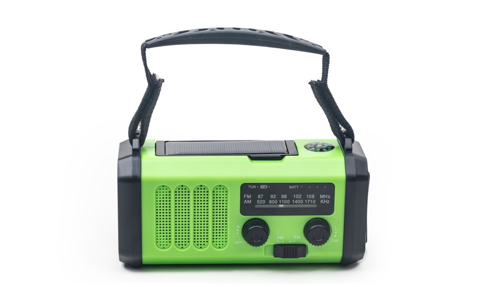 billede af en grøn nød-radio med bærestrop